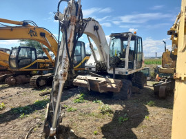 Brat excavator pe roti Case WX145