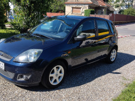 Ford fiesta 2006,1.25 benzina,5 usi,clima,computer de bord,roti iarna si vara